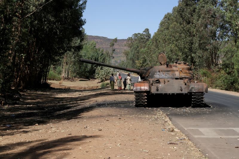 FILE PHOTO: FILE PHOTO: A burned tank stands near the town of Adwa, Tigray region, Ethiopia.