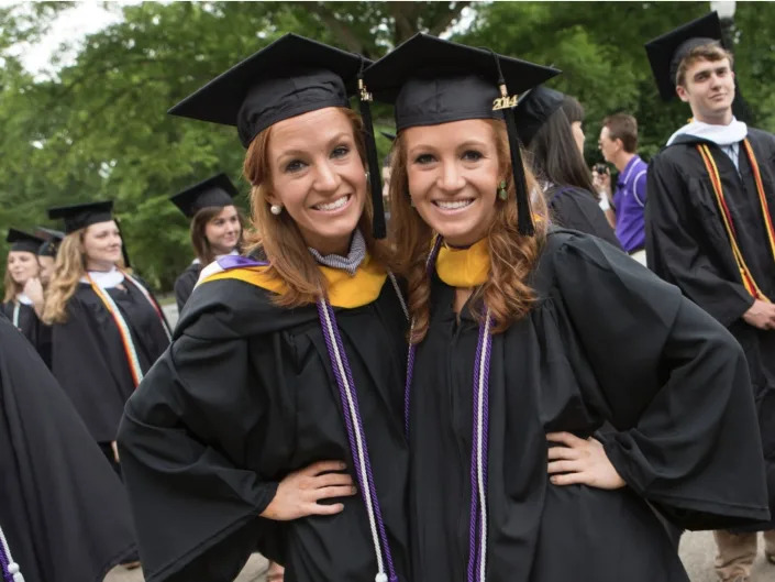 Kayla and Kellie Bingham when they graduated from college before attending medical school.