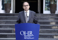 Christian Schmidt, new head of Bosnia's Office of the High Representative, or OHR, speaks during a ceremony in the capital Sarajevo, Bosnia, Monday, Aug. 2, 2021. Schmidt on Monday took office as the top international official in Bosnia, amid tensions with the country's Serbs who have rejected both his appointment and a ban on genocide denial brought by his predecessor. (AP Photo)