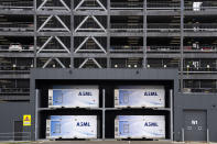 Exterior view of one of the buildings in the ASML complex, a leading maker of semiconductor production equipment, in Veldhoven, Netherlands, Monday, Jan. 30, 2023. ASML says the U.S., Dutch and Japanese officials are close to an agreement to limit China's access to the technology used to make computer chips. (AP Photo/Peter Dejong)