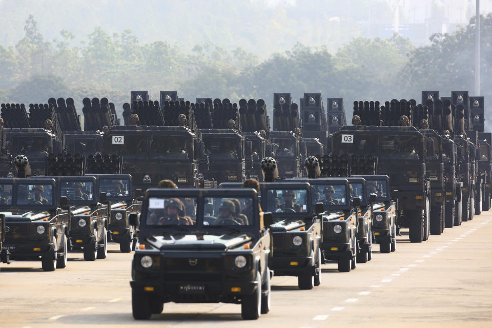 Myanmar military officers leave the venue during a parade to commemorate Myanmar's 78th Armed Forces Day in Naypyitaw, Myanmar, Monday, March 27, 2023. (AP Photo/Aung Shine Oo)