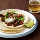 <p>Pair these easy pulled-pork tacos with refried beans, Mexican-style rice, and your favorite margarita for a south-of-the-border-inspired dinner that's simple, hearty, and satisfying. </p>