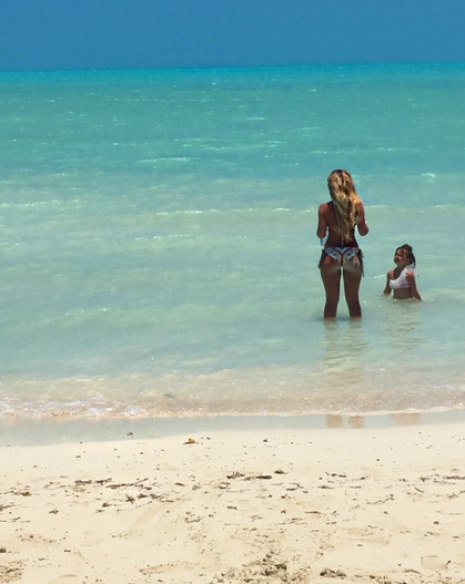 <p>Kim listened in on her eldest daughter Brielle’s conversation with Kaia: “Brielle says. ‘Kaia stand in the water with me, you get a way better tan that way.’ Kaia replies, ‘Count me in,'” Kim wrote. We’re not sure a 3-year-old needs to be tanning, but who are we to judge? (Photo: <a rel="nofollow noopener" href="https://www.instagram.com/p/BVArdj3Bqfg/" target="_blank" data-ylk="slk:Kim Zolciak-Biermann via Instagram" class="link ">Kim Zolciak-Biermann via Instagram</a>) </p>