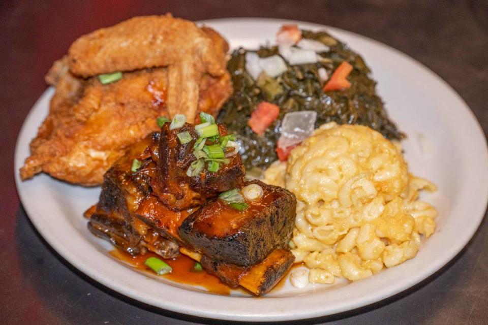 Mert’s Heart and Soul fried chicken and rib combo with macaroni and cheese and collards.