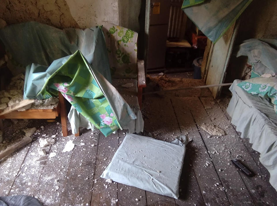 Rubble are seen inside a damaged house in Itbayat town, Batanes islands, northern Philippines after a strong earthquake struck on Saturday July 27, 2019. Two strong earthquakes hours apart struck a group of sparsely populated islands in the Luzon Strait in the northern Philippines early Saturday. (Agnes Salengua Nico via AP)