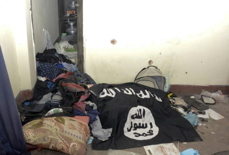 An Islamic State group flag at a location where suspected extremists were killed in a 2016 gun battle with police in Dhaka, Bangladesh