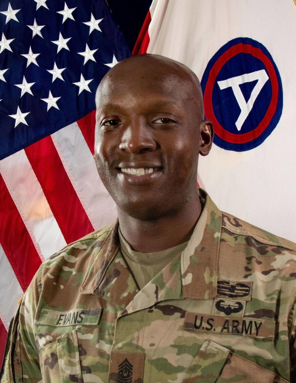 Command Sgt. Maj. Carlos Evans, 38, was killed in a shooting where three children also died.