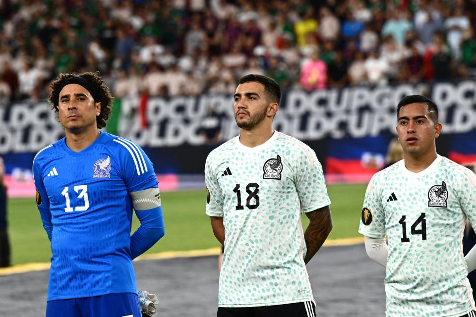 Mexico&#39;s goalkeeper Guillermo Ochoa (L), midfielder Luis Chavez (C) and forward Erick Sanchez stand on the pitch ahead of the Concacaf 2023 Gold Cup Group B football match between Haiti and Mexico at the State Farm stadium, in Glendale, Arizona on June 29, 2023. (Photo by Patrick T. Fallon / AFP) (Photo by PATRICK T. FALLON/AFP via Getty Images)