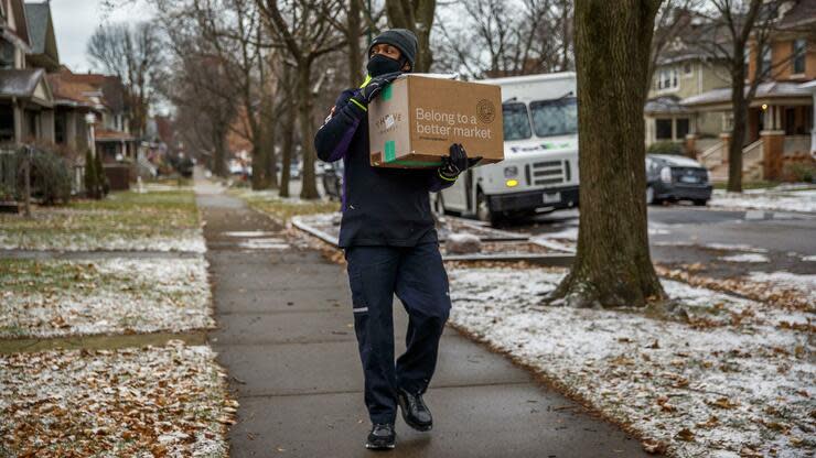 Die Aktie des Paketversanddienstes steigt wegen der guten Zahlen nachbörslich. Foto: dpa