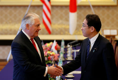 U.S. Secretary of State Rex Tillerson (L) shakes hands with Japan's Foreign Minister Fumio Kishida before their meeting at the foreign ministry's Iikura guest house in Tokyo, Japan, March 16, 2017. REUTERS/Toru Hanai