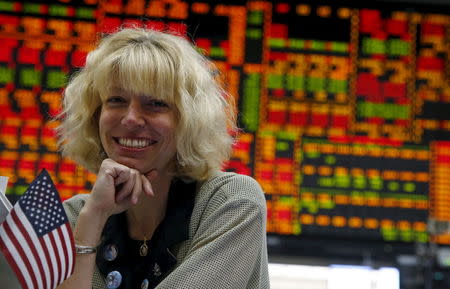 Commodities Corn Broker Kelly King-Taylor poses for a photo on the Chicago Board of Trade grain trading floor in Chicago. Illinois, United States, June 9, 2015. REUTERS/Jim Young