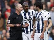 Britain Soccer Football - Manchester United v West Bromwich Albion - Premier League - Old Trafford - 1/4/17 West Bromwich Albion's Allan Nyom and West Bromwich Albion's Claudio Yacob speak to referee Mike Dean Action Images via Reuters / Lee Smith Livepic