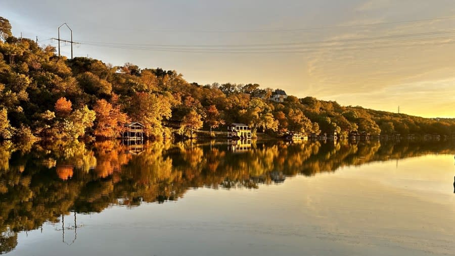 Trees reflected in Lake Austin in the River Place neighborhood on Nov. 23, 2023. (Courtesy John Graff)