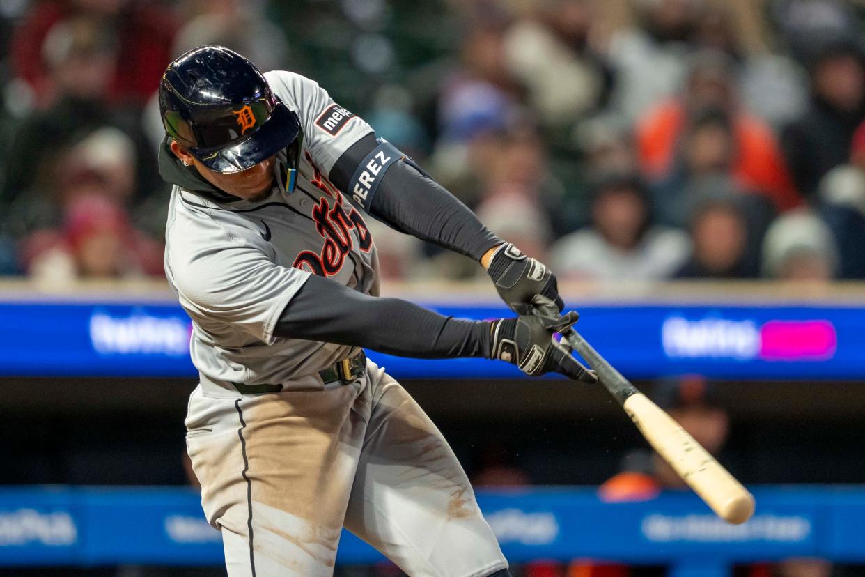 Tigers right fielder Wenceel Perez hits a RBI single in the ninth inning of the Tigers' 5-4 win over the Twins on Friday, April 19, 2024, in Minneapolis.