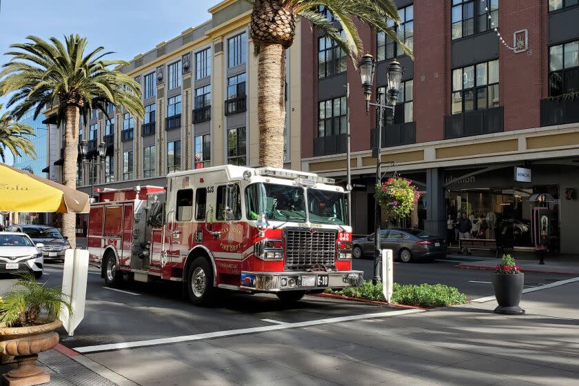 San Jose Fire Department fire engine drives down Santana Row in the Silicon Valley, San Jose, California, January 3, 2020. (Photo by Smith Collection/Gado/Getty Images)