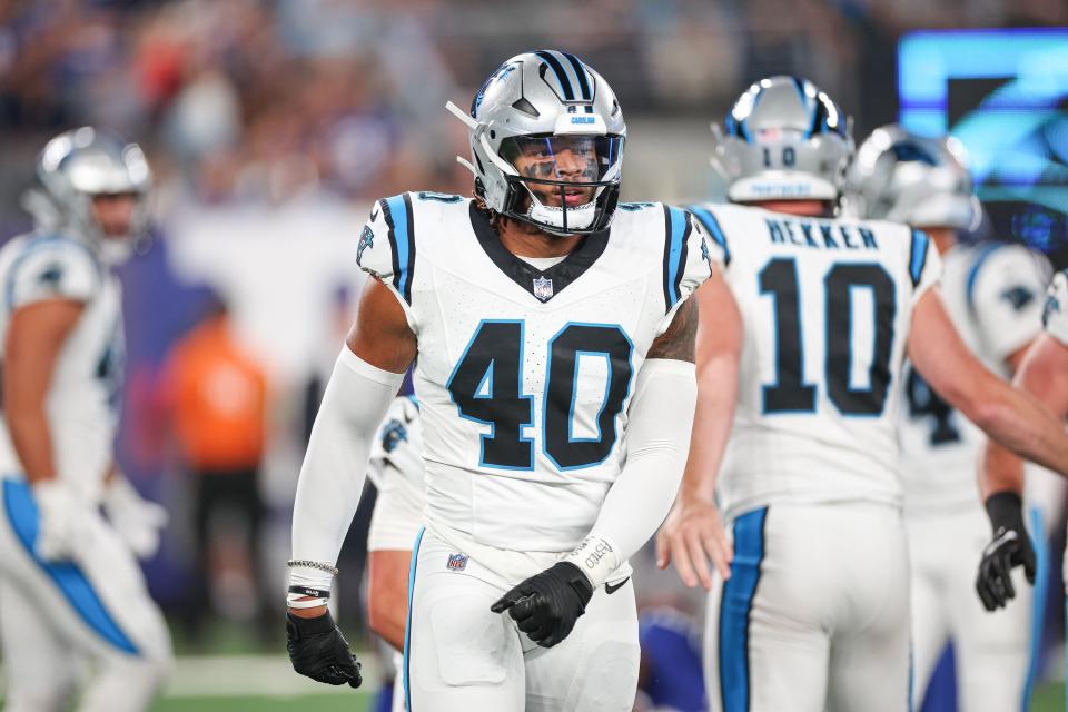 Aug 18, 2023; East Rutherford, New Jersey, USA; Carolina Panthers linebacker Brandon Smith (40) reacts after a tackle during the first half against the New York Giants at MetLife Stadium. Mandatory Credit: Vincent Carchietta-USA TODAY Sports