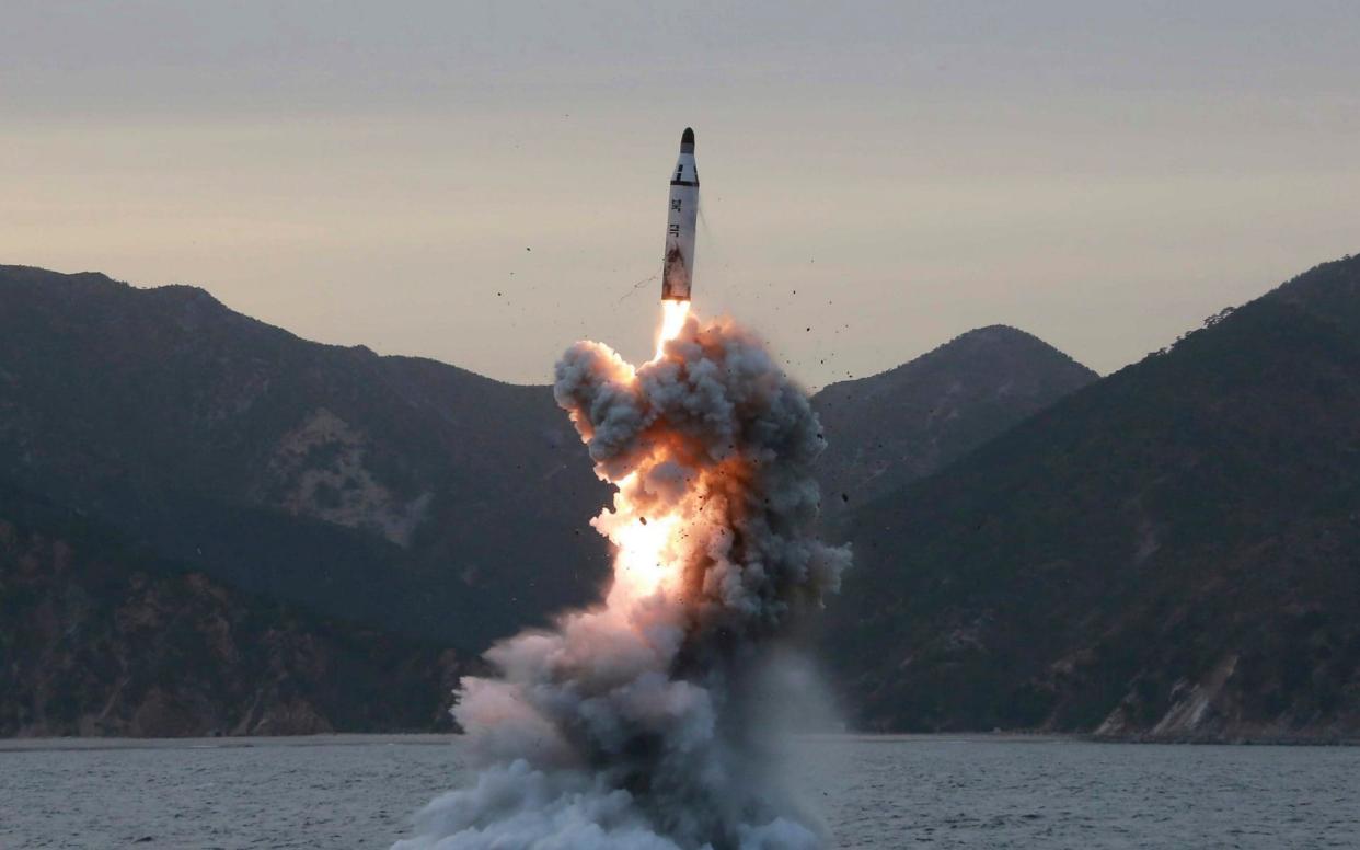 An 'underwater test-fire of strategic submarine ballistic missile' conducted at an undisclosed location in North Korea - KCNA