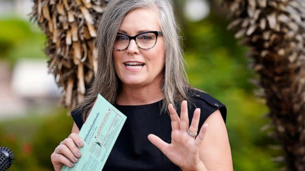 PHOTO: Arizona Democratic gubernatorial candidate Katie Hobbs speaks to the media before dropping off her primary election ballot, July 21, 2022, in Scottsdale, Ariz.  (Ross D. Franklin/AP, FILE)