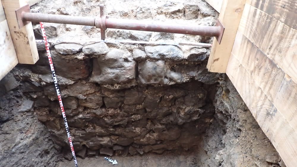  An excavation site of ruins of a 1,700-year-old stone wall. . 