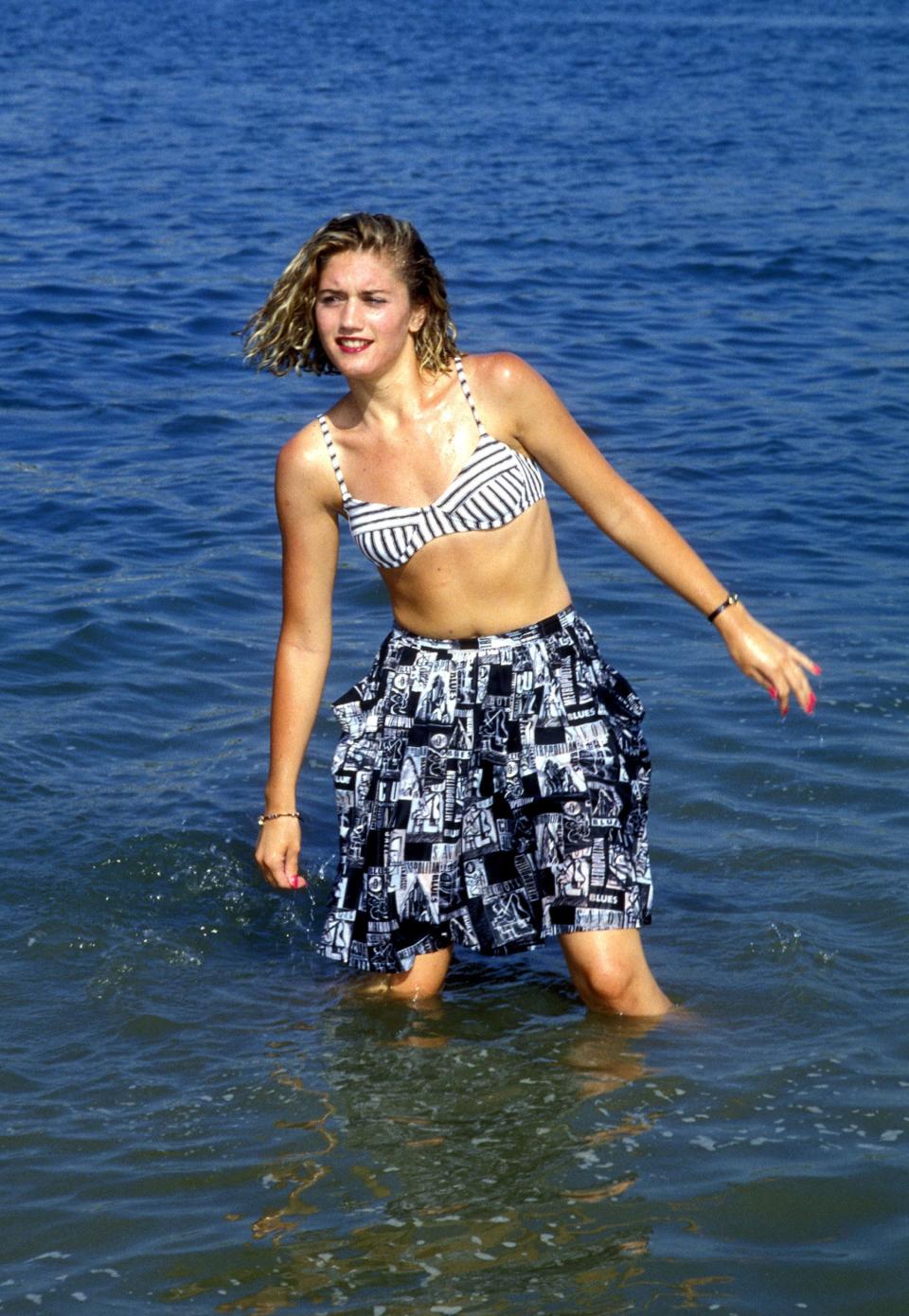 Baby Gwen rocked a striped bikini and patterned skirt while making waves at a concert in Newport Beach, California, in 1989. 