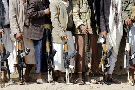 Tribesmen loyal to the Houthi movement hold their weapons at a gathering to show their support for the group, in Yemen's capital Sanaa December 15, 2015. REUTERS/Khaled Abdullah