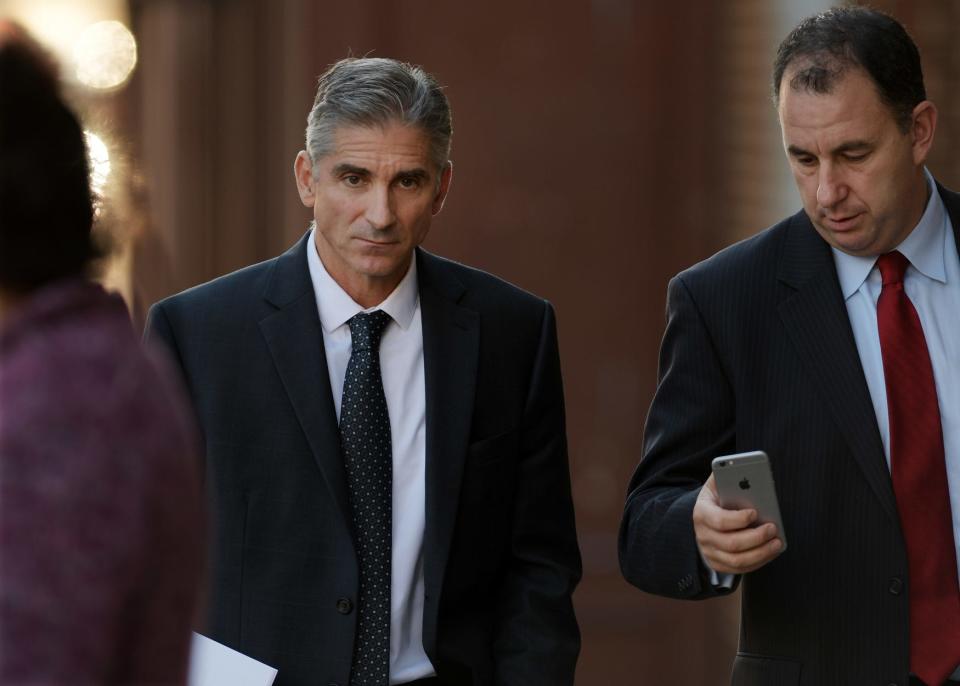 James M. Merrill, left, pleaded guilty in the TelexFree pyramid scheme in 2016.