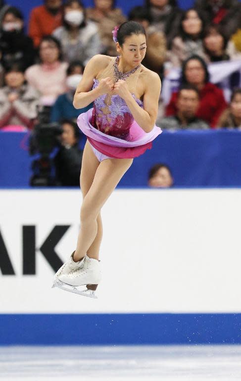 Mao Asada performs short program in women's single figure skating competition during Japan's national championships in Saitama, suburban Tokyo, on December 22, 2013