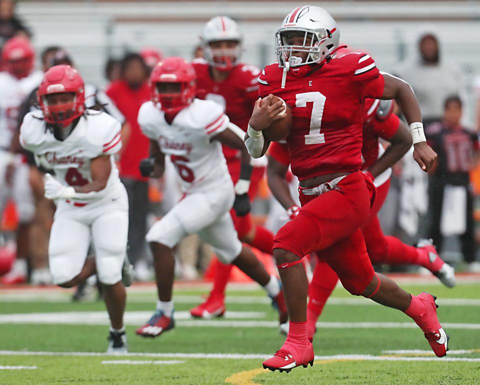 East's Zaire Stevens outraces Chaney defenders en route to the end zone for a touchdown Thursday in Akron.