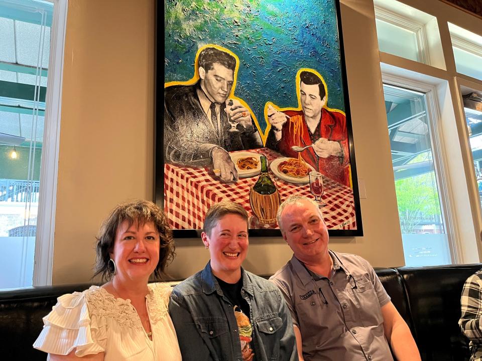 Cocozza American Italian owner Deni and Patrick Reilly with Memphis artist and chef Emily LaForce (center) at the unveiling of her original art titled “O Sole Meatball” that now hangs in the Downtown Memphis restaurant.