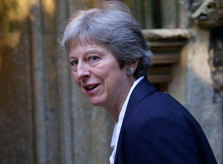 <em>The Prime Minister’s grip on her leadership has been weakened by the resignation (Rex)</em>
