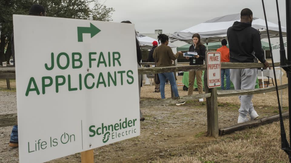 Job seekers check-in to a job fair at a Schneider Electric manufacturing facility in Hopkins, South Carolina, in January 2023. - Micah Green/Bloomberg/Getty Images