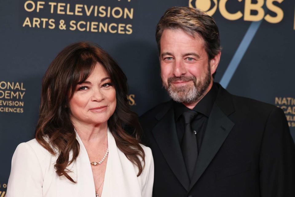 <p>Rodin Eckenroth/Getty </p> Valerie Bertinelli and Mike Goodnough smile together at the 51st annual Daytime Emmys Awards on June 7, 2024 