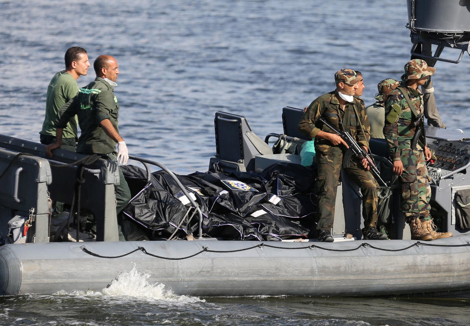 The bodies of victims of a boat carrying migrants that capsized in Al-Beheira