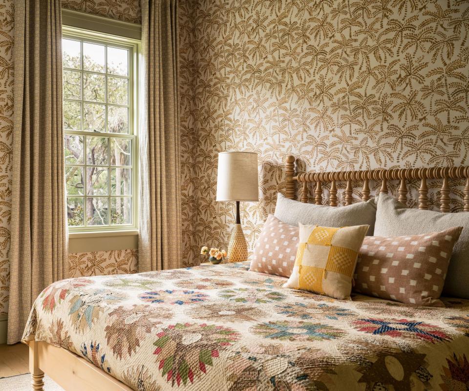 Brown-decorated small bedroom with double bed