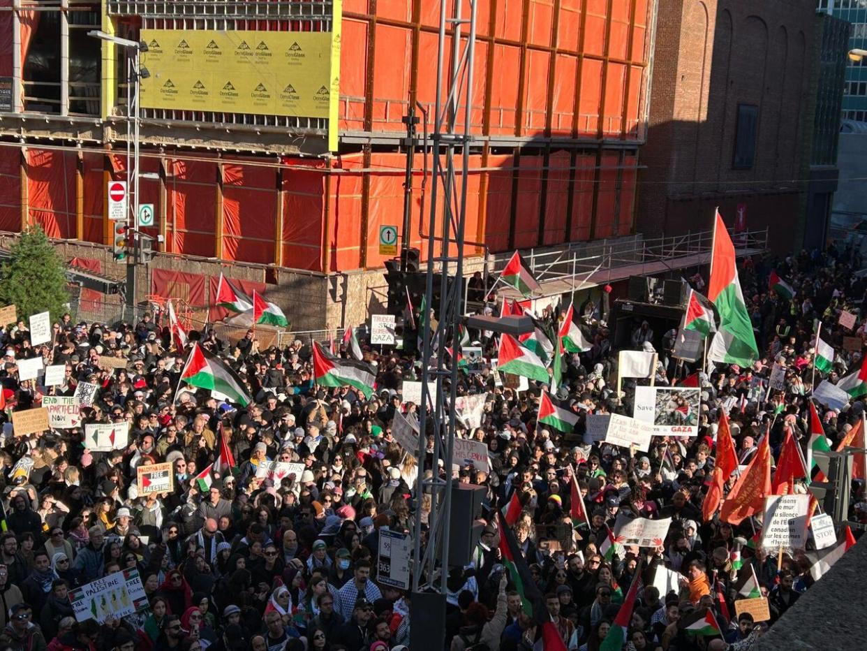 People filled Place-des-Arts square from Clark Street to Jeanne-Mance Street to show their support for Palestinians in Gaza. (Erika Morris/CBC - image credit)