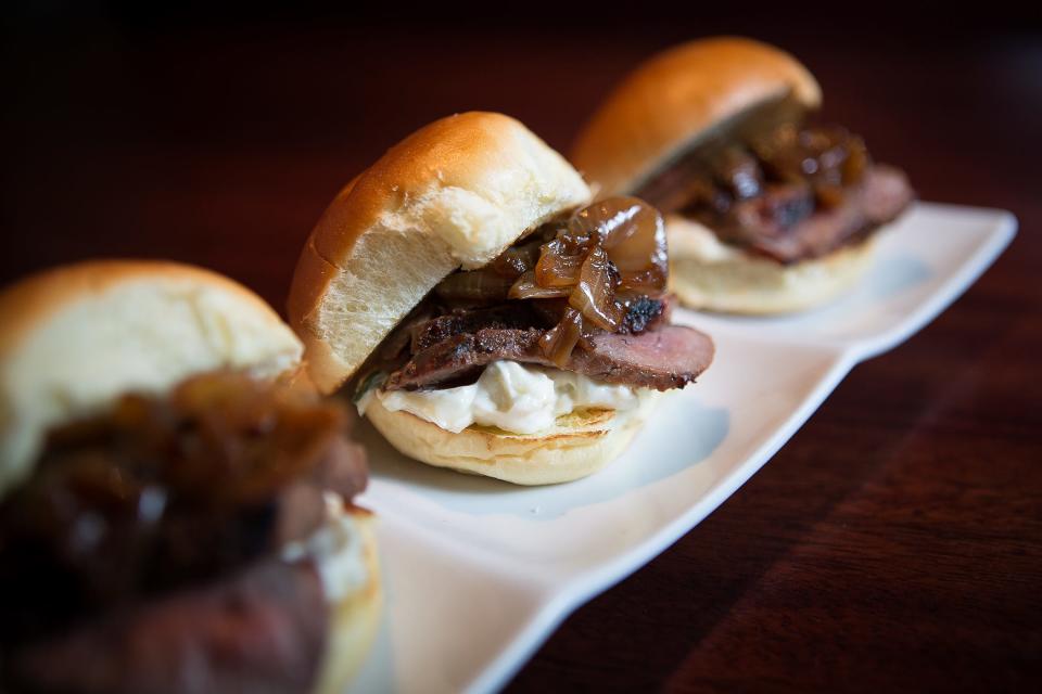 Happy-hour treat: The steak sliders that are a favorite during happy hour at Okeechobee Steakhouse are now also offered at its sister restaurant, Lewis Steakhouse.