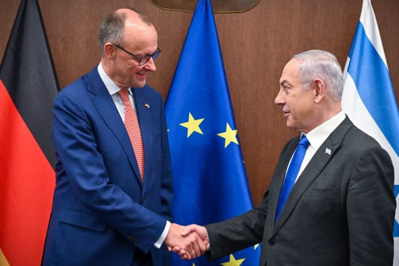 Israeli Prime Minister Benjamin Netanyahu (R) meets Leader of the Christian Democratic Union and Leader of the Opposition in Germany Friedrich Merz at the Prime Minister's Office in Jerusalem. Kobi Gideon/GPO/dpa