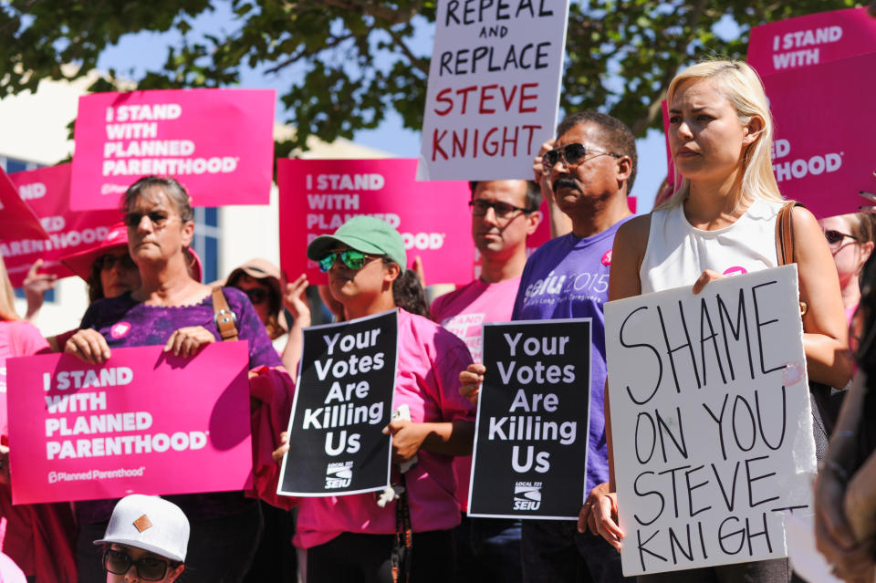 <span class="s1">Protesters gather outside the office of Republican Rep. Steve Knight in 2017 after the House voted to repeal the Affordable Care Act. (Photo: Andrew Cullen/Reuters)</span>