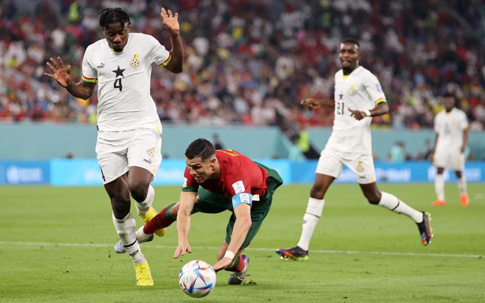 Cristiano Ronaldo of Portugal is brought down by Mohammed Salisu - Clive Brunskill/Getty Image