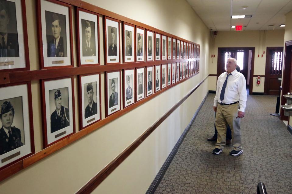 Dan Pallotta, Arpa Manager for Capital Projects, takes in the view of the wall of honor at the Brockton War Memorial, currently under renovation, dedicated to Brockton area veterans who served this country in the military, on Monday, Feb. 5, 2024.