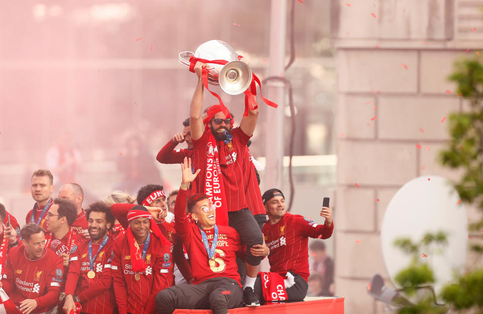 Soccer Football - Champions League - Liverpool victory parade - Liverpool, Britain - June 2, 2019  Liverpool's Alisson with the trophy during the parade  Action Images via Reuters/Jason Cairnduff