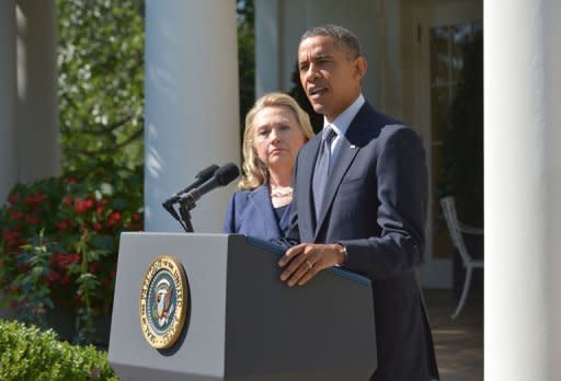 President Barack Obama, joined by Secretary of State Hillary Clinton, condemned the "outrageous" attack which killed four Americans including the US ambassador in Libya but vowed it would not break America's bond with the newly liberated nation