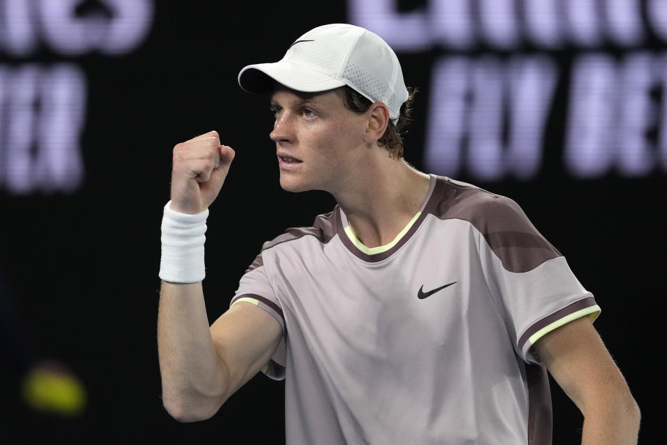 Jannik Sinner of Italy reacts during the men's singles final match against Daniil Medvedev of Russia at the Australian Open tennis championships at Melbourne Park, in Melbourne, Australia, Sunday, Jan. 28, 2024. (AP Photo/Alessandra Tarantino)