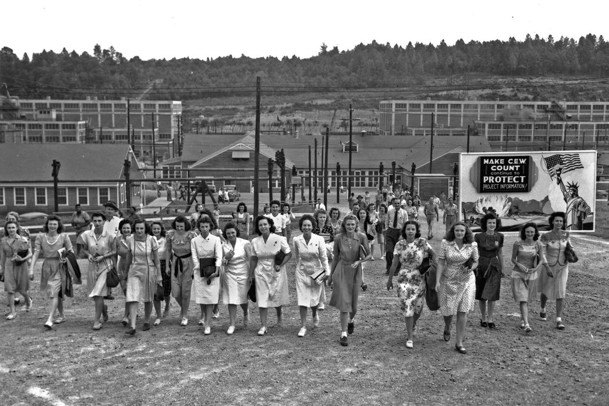 Workers leaving the Manhattan Project's Y-12 plant at shift changing time, 1945