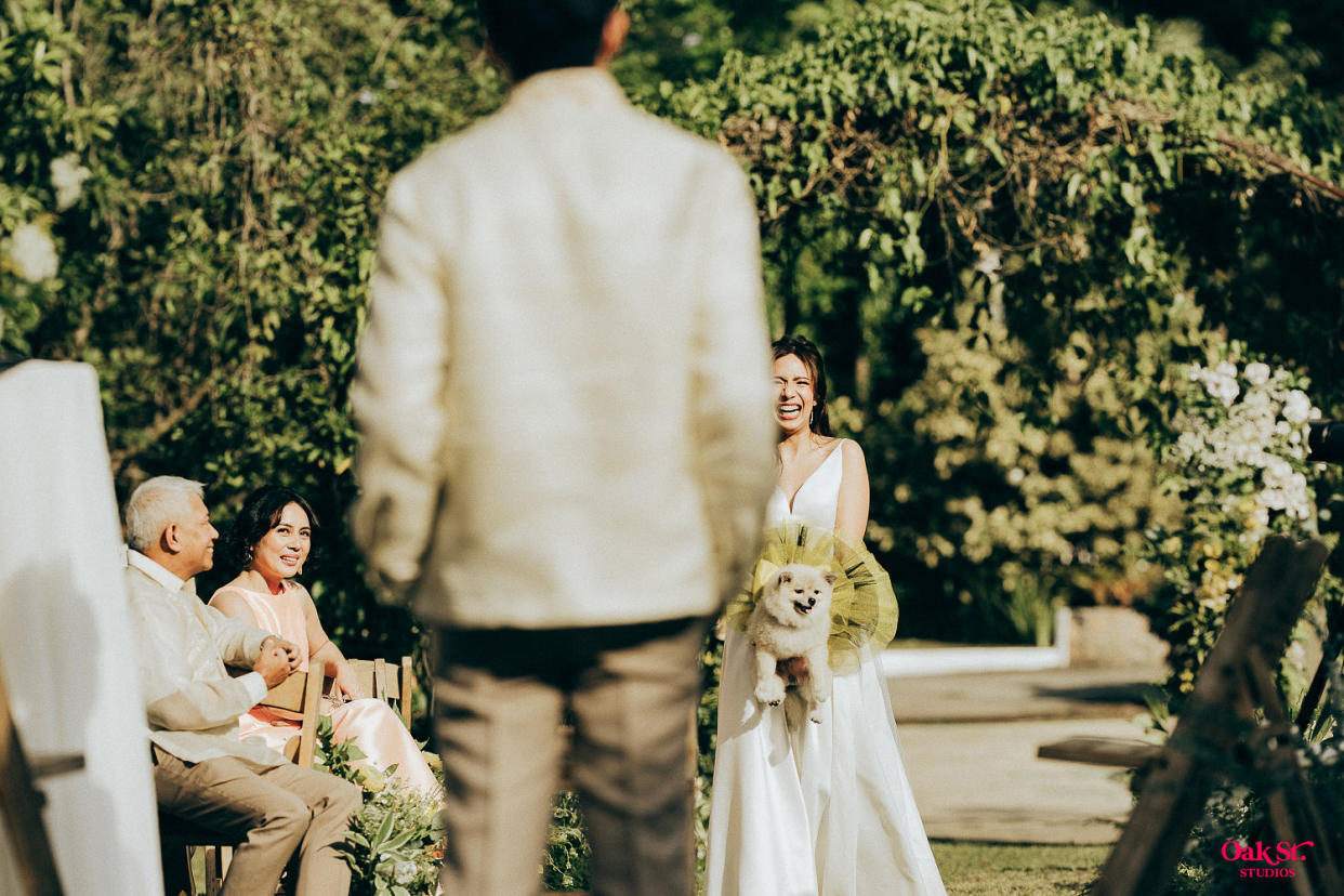 Sago dressed the part for the couple's garden-themed ceremony. (Courtesy Oak St. Studios)