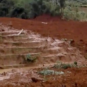 Landslide spills over rice fields in Brebes, Indonesia February 22, 2018, in this still image from a video obtained by social media. Instagram/edeetdr/Dede Setiawan/via REUTERS