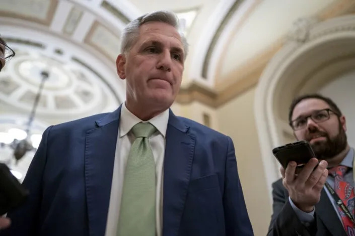 FILE - House Minority Leader Kevin McCarthy, R-Calif., talks to reporters at the Capitol in Washington, Wednesday, April 6, 2022. The new 118th Congress, with Republicans in control of the House, begins Jan. 3, 2023, but the first task for the GOP is electing a new speaker and whether House Republican Leader Kevin McCarthy, R-Calif., can overcome opposition from conservatives in his own ranks to get the job. (AP Photo/J. Scott Applewhite, File)