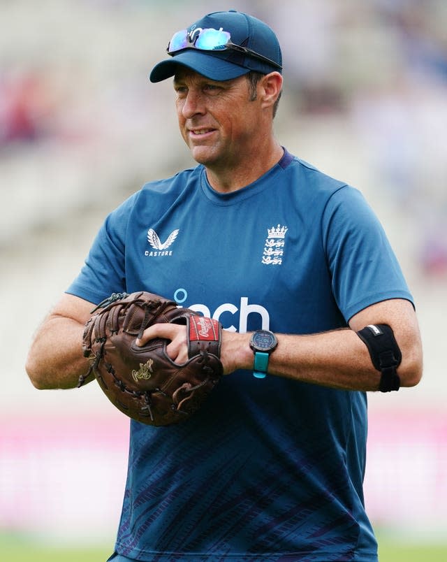 Marcus Trescothick clutches a catching mitt during an England training session in 2023.