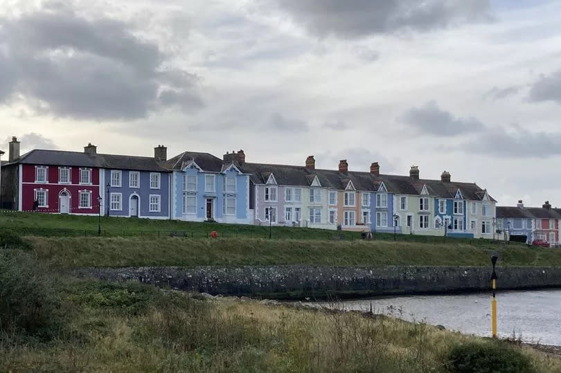 A row of landmark coloured houses