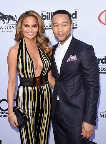 Chrissy Teigen and John Legend are gearing up to throw a major Memorial Day bash -- and the 29-year-old super model is revealing why the duo is the ultimate party-throwing power couple! “John and I -- we like to think of ourselves as the king and queen of BBQ hosting,” Chrissy told ET. Getty Images “This weekend of course, Memorial Day weekend, we’re going to have a big BBQ because we don’t get to see our friends that often,” she added before revealing that she and John would be cooking up half of the meal themselves while the other half will be catered. <strong>RELATED: </strong> 27 Times Chrissy Teigen Was The Realest Celeb Ever “When you have that many people you just try to bring in as much help as you can get -- sometimes I take on too much. Last Thanksgiving I made 22 sides…. it took three days!” she exclaimed. “So, now I’ve learned to bring someone in for things like ribs... I’m a ‘sides’ girl,” Chrissy added. “John will make his mac [and cheese] and fried chicken… I will do my potato salad and I have an artichoke dip that I love to do. There’s going to be a ton of food.” Chrissy is the new spokes-celeb for Captain Morgan and added that she’ll be making a signature cocktail for her guests called the Shark Puncher. For those looking for some cocktail inspiration -- Chrissy assures us it’s super easy to make at home. <em>(You can find Chrissy’s recipe at the bottom of the story.) </em> “I can make an Ossobuco! But for me, shaking up a cocktail was always a little terrifying to me… I think everyone at our BBQ is going to be very impressed by it.” <strong>NEWS:</strong> Why Chrissy Teigen Is Anti-Photoshop Menu aside, what else makes a bash successful for John and Chrissy? “I’d say one of them is honestly to bring in some help and have some time with your friends,” she shared. “Start early and don’t do the ‘goodbye’ thing. if you ever been to one of my parties- I never say goodbye, I go - 'I have to go to the bathroom' and then I leave and don’t come back – it’s the sneak-away!” But most importantly she says it’s important for her and John, 36, to make time for one another no matter how busy they are entertaining their lucky guests. “I think paying attention to your significant other… John and I, we host these things, and we end up not really getting to speak to each other all night because were in all these different directions and I think it’s important if you’re a couple, to be a couple and host this together,” she said before adding, “and drink responsibly!” <u><strong> Chrissy’s Shark Punch Ingredients: </strong></u> (Serves 6) • 9 oz Captain Morgan Coconut Rum • 9 oz Orange Juice • 3 oz Ruby Red Grapefruit Juice • 6 oz Cranberry Juice <strong><em> Follow Katie on Twitter: @Katie_Krause </em></strong>